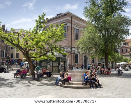VENICE, ITALY - 05/05/2015:  Tourists in Campo Santi Apostoli square
