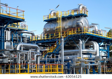 Oil industry equipment installation, metal pipes and tanks