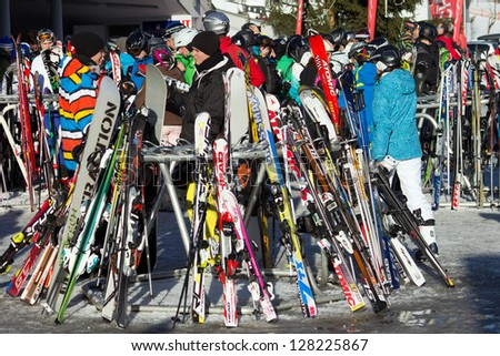 FLACHAU, AUSTRIA - DEC 29: People at the ski pistes in the ski resort town of Flachau, Austria on Dec 29, 2012. These pistes are part of the Ski Armada network, the largest of Europe.
