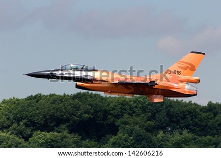 VOLKEL, THE NETHERLANDS - JUNE 15: Dutch demo F-16 taking off to perform at the Dutch Air Force Open Day on June 15, 2013 in Volkel, The Netherlands