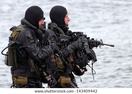 DEN HELDER, THE NETHERLANDS - JUNE 23: Dutch Special Forces during an amphibious assault demo during the Dutch Navy Days on June 23, 2013 in Den Helder, The Netherlands