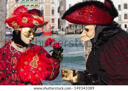 VENICE - FEBRUARY 7: Costumed people during Venice Carnival on February 7, 2013 in Venice, Italy. This year the Carnival was held between January 26 - February 12.