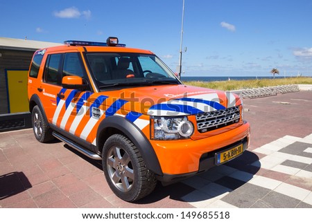 ZANDVOORT, HOLLAND - AUG 8: Dutch lifeguard Land Rover Discovery on standby at the Beach on Aug 8, 2013 in Zandvoort, The Netherlands. Two cars were delivered to the Zandvoort lifeguard in 2007.