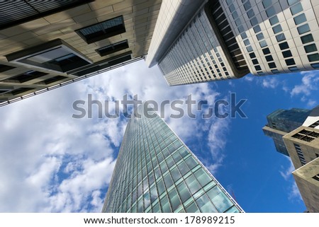 FRANKFURT, GERMANY - JULY 11: Ground view on the skyscrapers in downtown Frankfurt on July 11, 2013 in Frankfurt. The tower on the right side is the Silberturm, on the left the Skyper