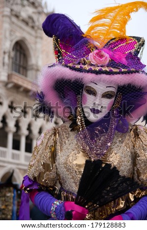 VENICE - FEBRUARY 5: Costumed woman on the Piazza San Marco during Venice Carnival on February 5, 2013 in Venice, Italy. This year the Carnival was held between January 26 - February 12.