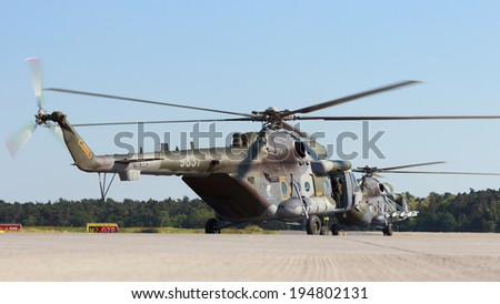 BERLIN, GERMANY - MAY 22: Two Czech Air Force Mi-171 helicopters about to take off to perform a demonstration at the International Aerospace Exhibition ILA on May 22nd, 2014 in Berlin, Germany.