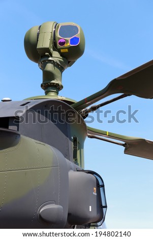 BERLIN, GERMANY - MAY 21: Mast-mounted sight with infrared and CCD TV cameras on a EC665 Tiger attack helicopter at the International Aerospace Exhibition ILA on May 21st, 2014 in Berlin, Germany.