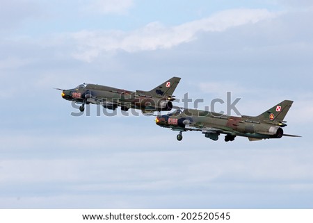 VOLKEL, THE NETHERLANDS - JUNE 15:Polish Sukhoi Su-22 bomber planes take off at the Dutch Air Force Open Day on June 15, 2013 in Volkel, The Netherlands
