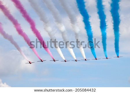 GILZE RIJEN, THE NETHERLANDS - JUNE 21: RAF Red Arrows performing at the Dutch Air Force Open House. June 21, 2014 in Gilze-Rijen, The Netherlands
