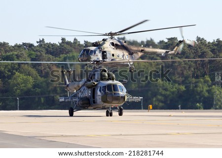BERLIN, GERMANY - MAY 22: Two Czech Air Force Mi-171 helicopterslanding after a demonstration at the International Aerospace Exhibition ILA on May 22nd, 2014 in Berlin, Germany.