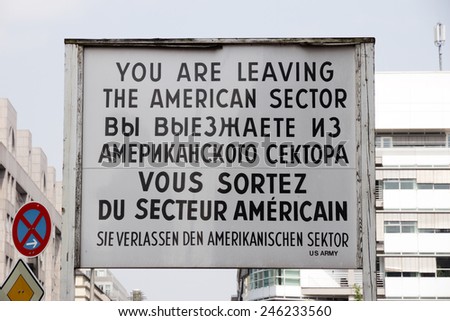 Historical sign at the former Checkpoint Charlie border crossing in Berlin, German