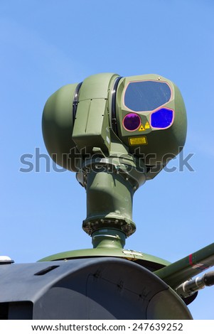 BERLIN, GERMANY - MAY 21: Mast-mounted sight with infrared and CCD TV cameras on a EC665 Tiger attack helicopter at the International Aerospace Exhibition ILA on May 21st, 2014 in Berlin, Germany.