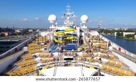 AMSTERDAM - SEP 2, 2014: Deck on the Costa Fortuna cruise ship with a view over Amsterdam. The ship is part of a fleet of 17 ships owned by Costa Cruises.