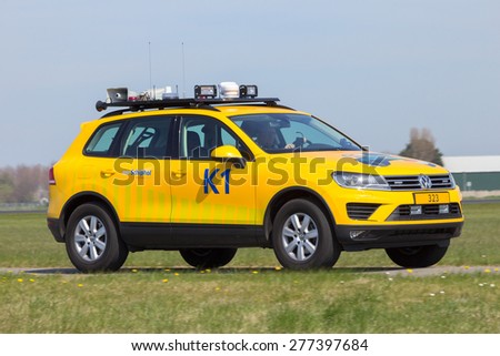 Amsterdam-Schiphol - April 21, 2015: Volkswagen Touareg as a Airport Bird Control car at Schiphol airport. These cars are equipped with tools to scare birds away and prevent aircraft bird strikes.
