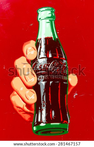 DEN BOSCH, THE NETHERLANDS - MAY 10, 2015: A Coca Cola logo on a vintage Coke machine.