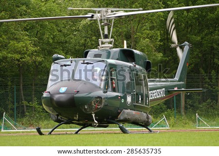 BONN, GERMANY - MAY 22, 2010: German Border patrol Bell 212 helicopter about to take off during the Bundesgrenzschutz open house at Bonn-Hangelar airport.