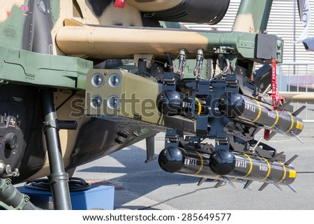 BERLIN, GERMANY - MAY 21, 2014: Roketsan UMTAS rockets on a Turkish Aerospace Industries T129 Attack helicopter at the Int. Aerospace Exhibition ILA.