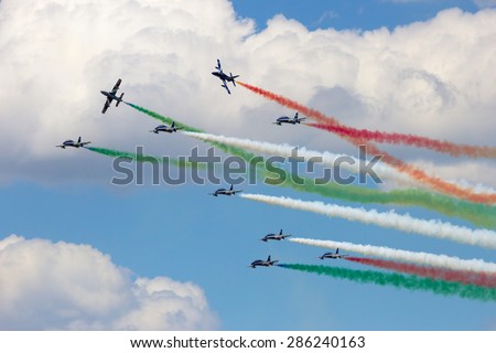 VOLKEL, THE NETHERLANDS - JUNE 15, 2013: Italian demo team Frecce Tricolori performing at the Dutch Air Force Open Days. The team will replace their MB339 aircraft with Alenia Aermacchi M-345 in 2017.