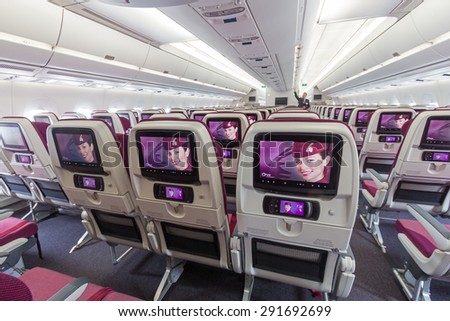 PARIS - JUN 18, 2015: Cabin view of a Qatar Airways Airbus A350. Qatar Airways is the first user of the A350 with it\'s first flight on 15 January 2015.