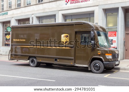 LONDON - JULY 2, 2015: UPS truck in a street in London. UPS is one of largest package delivery companies worldwide with 397,100 employees and USD 54.1 billion revenue (2012).
