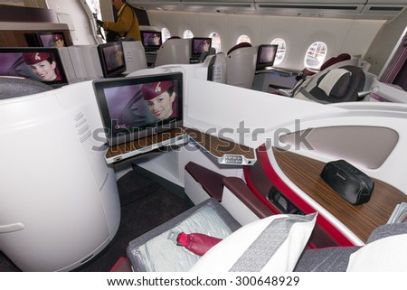 PARIS - JUN 18, 2015: First Class seat in a Qatar Airways Airbus A350. Qatar Airways is the first user of the A350 with it\'s first flight on 15 January 2015.