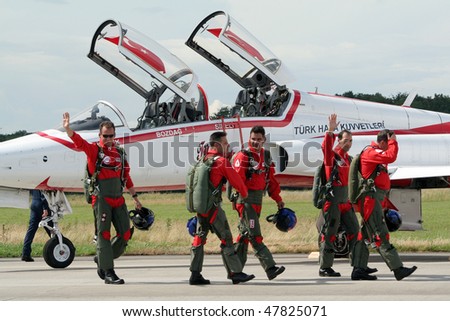 VOLKEL, NETHERLANDS - JUNE 16: Turkish Stars after performing on the Royal Netherlands Air Force Days June 16, 2007 in Volkel, Netherlands.