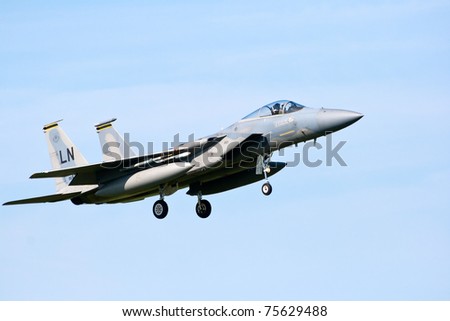 LEEUWARDEN, THE NETHERLANDS - APRIL 12: United Stated Air Force F-15 Eagle landing during the exercise Frisian Flag 2010. Leeuwarden Airbase april 12, 2010 in Leeuwarden, The Netherlands
