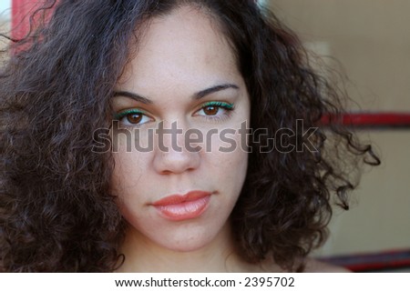 Stunning portrait of a young woman.  Simple, clean, with great complexion.