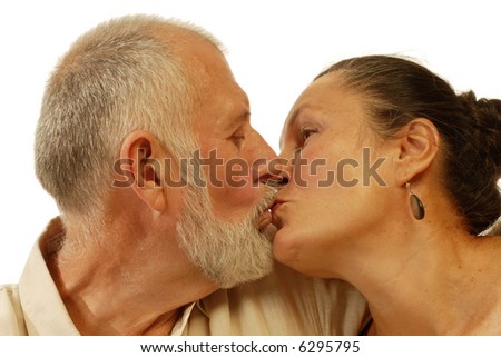 couple kissing. Senior couple kissing;