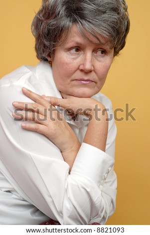 Introspective portrait of a lonely older woman