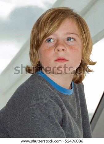 Candid portrait of 9-year-old boy, using natural light.