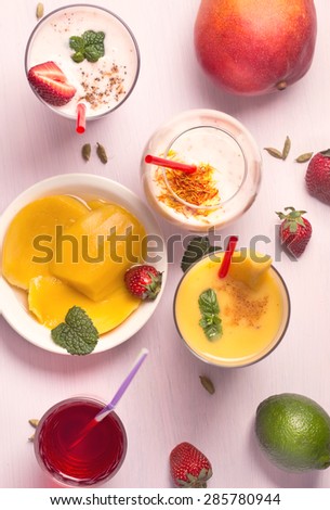 Mango and strawberry smoothies top view