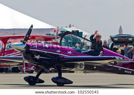 SANTA ROSA, CA - AUG 20: Vicky Benzing in her purple Extra 300S after demonstration of  high performance aerobatics during the Wings Over Wine Country Air Show, on August 20, 2011, Santa Rosa, CA.