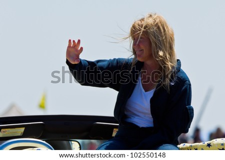SANTA ROSA, CA - AUG 20: Vicky Benzing is waving to spectators after demonstration of high performance aerobatics during the Wings Over Wine Country Air Show, on August 20, 2011, Santa Rosa, CA.