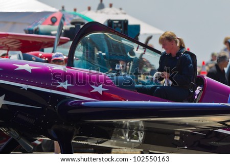 SANTA ROSA, CA - AUG 20: Vicky Benzing in her purple Extra 300S after demonstration of  high performance aerobatics during the Wings Over Wine Country Air Show, on August 20, 2011, Santa Rosa, CA.
