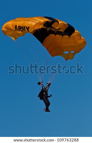 HILLSBORO, OR - AUG 4: A member of the US Army Golden Knights Parachute Team performs at the Oregon Air Show at Hillsboro Airport on August 4, 2012 in Hillsboro, OR.