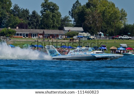 TRI-CITIES, WA - JULY 29: J. Michael Kelly pilots U-37 Miss Beacon Plumbing hydroplane along the water at the Lamb Weston Columbia Cup July 29, 2012 on the Columbia River in Tri-Cities, WA.