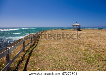 Ocean coastline landscape. Ocean coastline landscape with gazebo and fence.