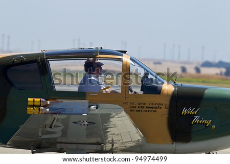 TRAVIS AIR FORCE BASE, CA - JULY 30: Professional Airshow Pilot and Announcer Steve Stavrakakis taxi  on his IAR-823 after landing during Airshow  on July 30, 2011 at  Travis Air Force Base, CA.
