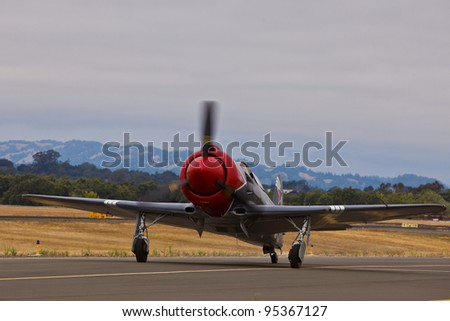 SANTA ROSA, CA - AUG 21: Pilot Will Whiteside taxi on his Yakovlev model 3U, or a YAK3U/R2000 during the Wings Over Wine Country Air Show, on August 21, 2011, Sonoma County Airport, Santa Rosa, CA.