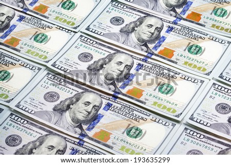 Heap of one hundred dollar banknotes as background