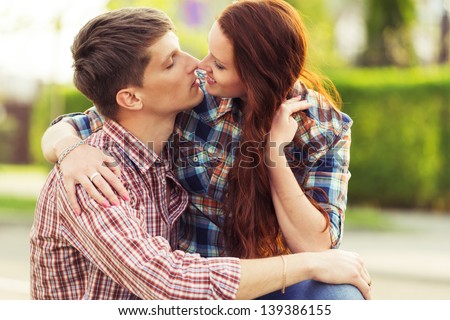kissing lovely couple. sensual photo young family