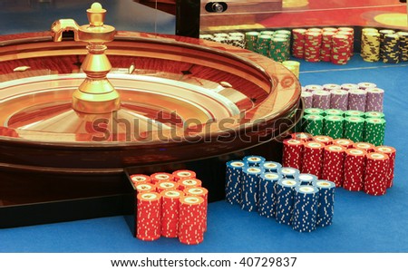 casino - spinning roulette wheel with ball, in expectation of good luck