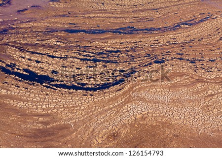 The surface of the used drilling mud with oil