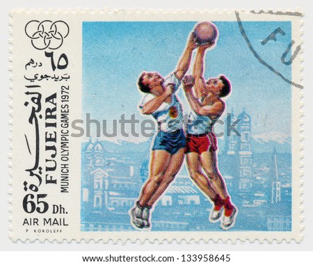 UNITED ARAB EMIRATES - CIRCA 1972: A stamp printed in Fujeira, shows Olympic Games in Munich in 1972, basketball, circa 1972