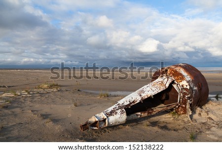 Old river buoy beached on the Yamal Peninsula, Russia
