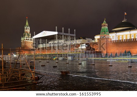 MOSCOW, RUSSIA - SEPTEMBER 29: Evening dismantling of structures with Olympic symbols after the sports festival on Red Square, Moscow, Russia, September 29, 2013