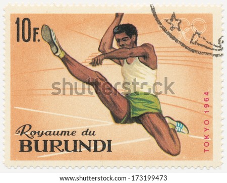 BURUNDI - CIRCA 1964: A stamp printed in Burundi shows Broad jump, series Olympic Games in Tokyo, circa 1964
