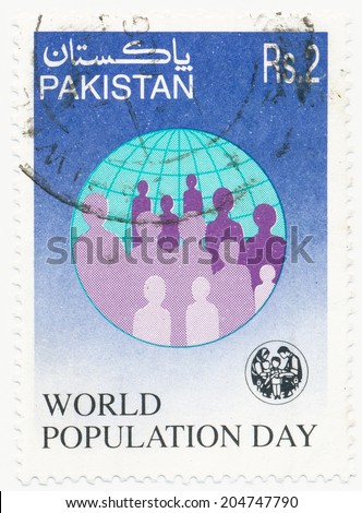 PAKISTAN - CIRCA 1997: A stamp printed in Pakistan shows people and globe, World Population Day, circa 1997