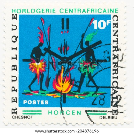 CENTRAL AFRICAN - CIRCA 1972: A stamp printed in Central African Republic shows Warriors at the campfire, circa 1972